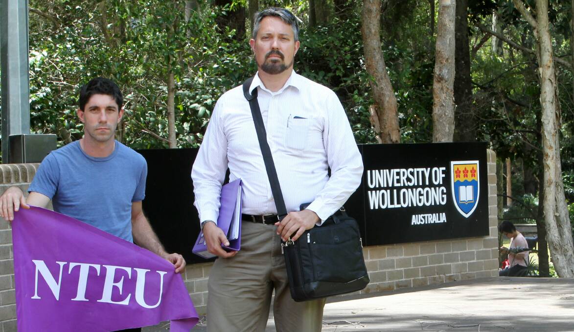 Bargaining breakdown: NTEU negotiators Martin Cubby and Clark Holloway at the university. Picture: GREG TOTMAN