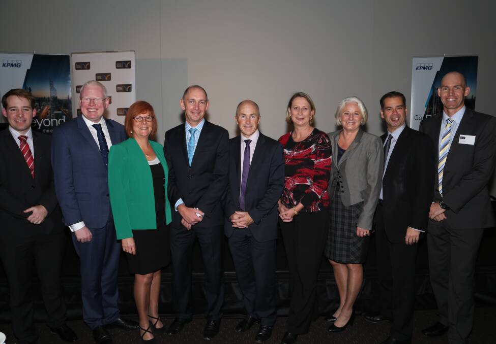 Positive: Anthony Mason, Kiama MP Gareth Ward, Debra Murphy, Kevin Ayres, Craig James, Cunningham MP Sharon Bird, Sue Baker-Finch, Warwick Shanks and Adam Cole at the Illawarra Business Chamber, KPMG and Commonwealth Bank annual federal budget business lunch. Picture: GREG ELLIS