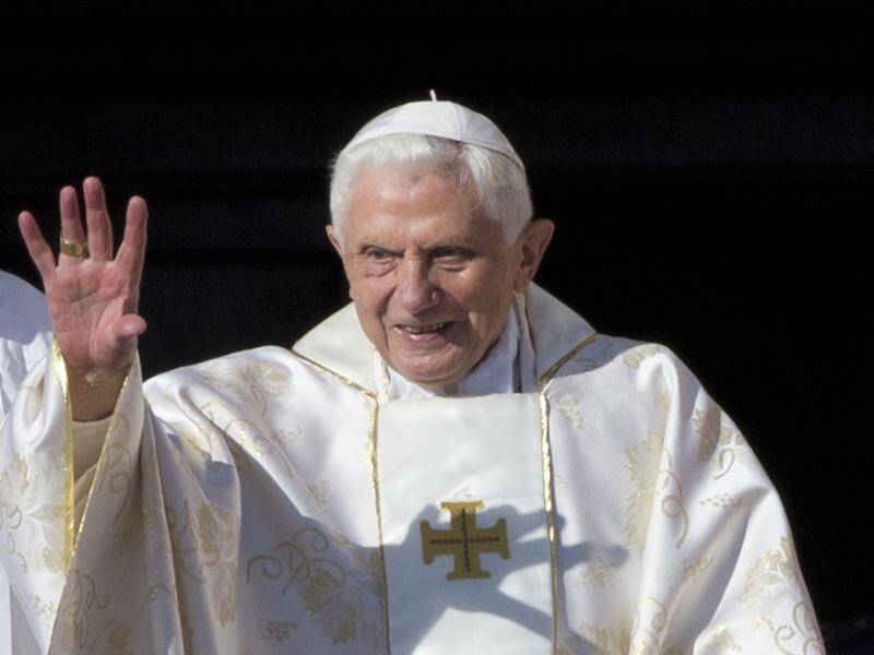 Unlike Pope John Paul II, the shy and avuncular Benedict did not have the people's touch. (AP PHOTO)
