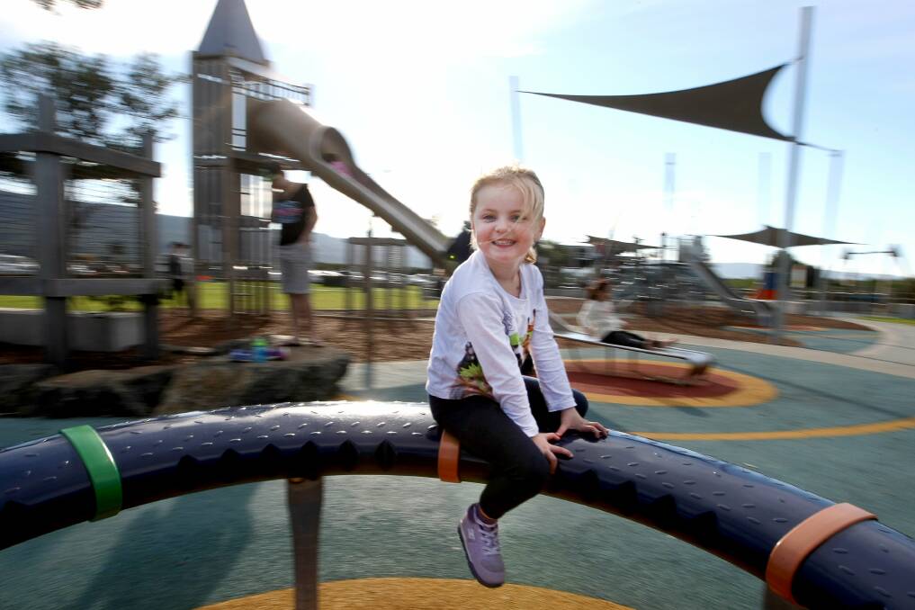 Kaylee Taylor, 5, at Towradgi playground, one of 155 play spaces in the Wollongong local government area. Picture: SYLVIA LIBER