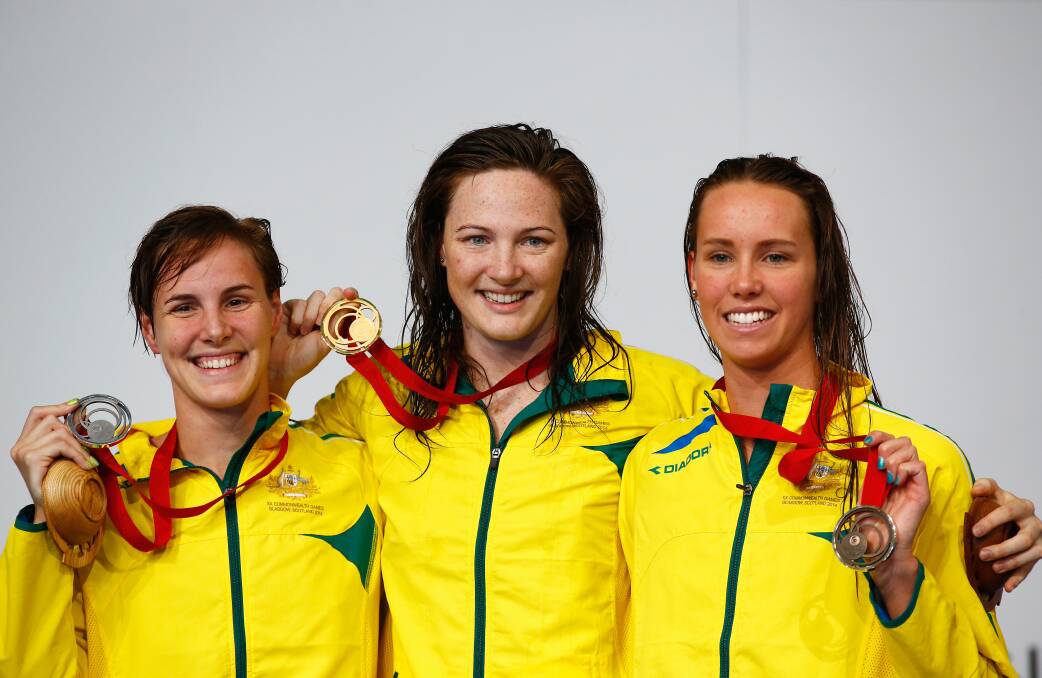 Bronte and Cate Campbell with their silver and gold, and Emma McKeon with bronze. Picture: GETTY IMAGES