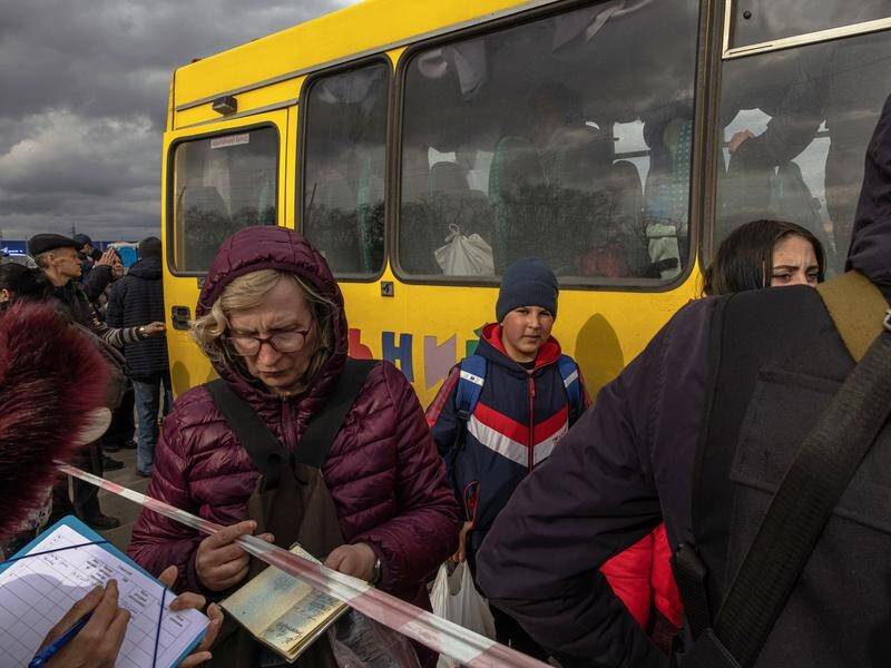 Some people from Mariupol have been able to leave the city in buses but others remain trapped.