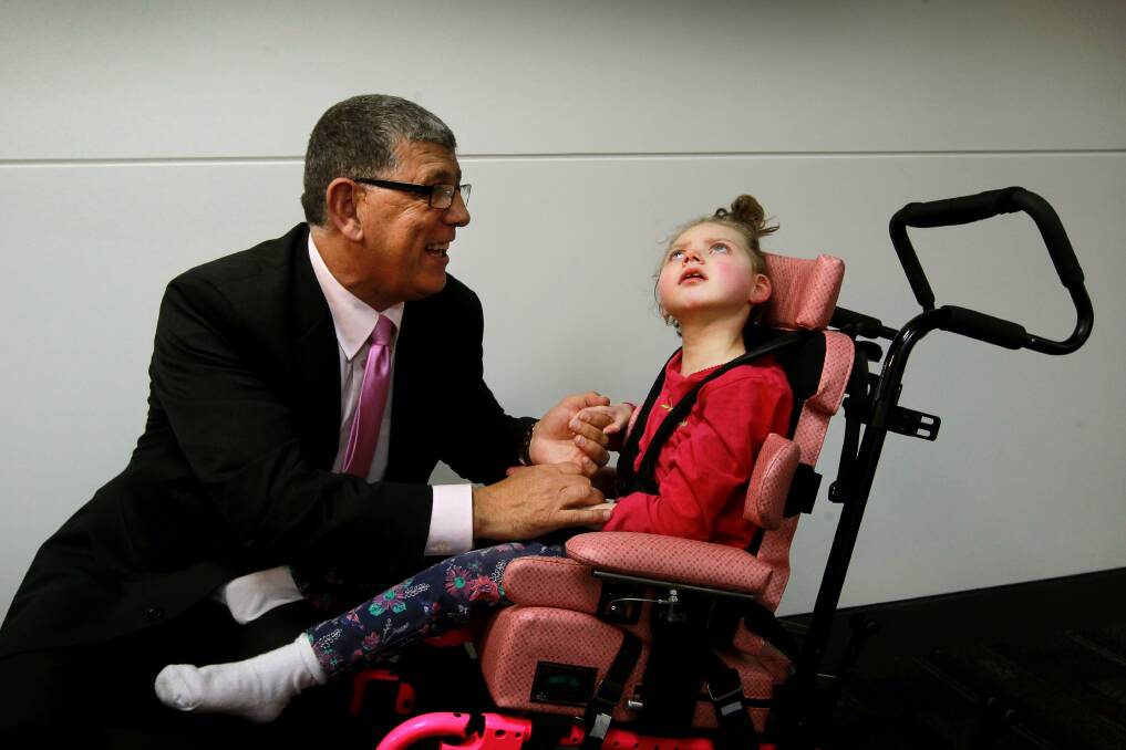 John Ajaka with Gracie Wallis, 8, at the launch of the Illawarra Disability Alliance. Picture: SYLVIA LIBER