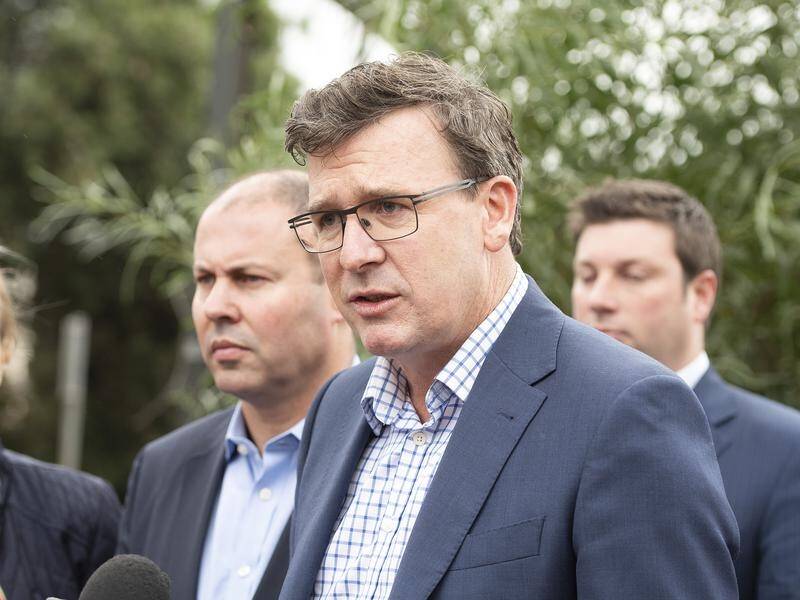Federal minister Alan Tudge has tried to distance his colleagues from a far right extremist.