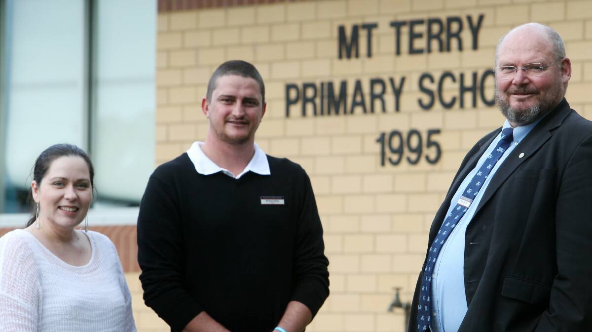 Mount Terry Public School teachers Leia Blanch and Ryan Bailey, with principal Paul Murray. Picture: GREG TOTMAN