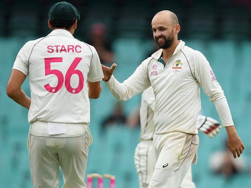 Shane Warne says Mitchell Starc and Nathan Lyon (r) aren't 