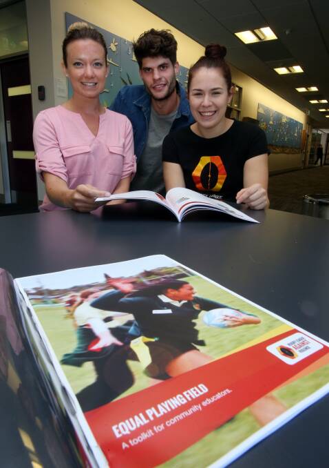 Kelsey Oke, Nicholas Underhill and Lauren Cassilles at UOW with information on the Rugby League Against Violence program. Picture: ROBERT PEET