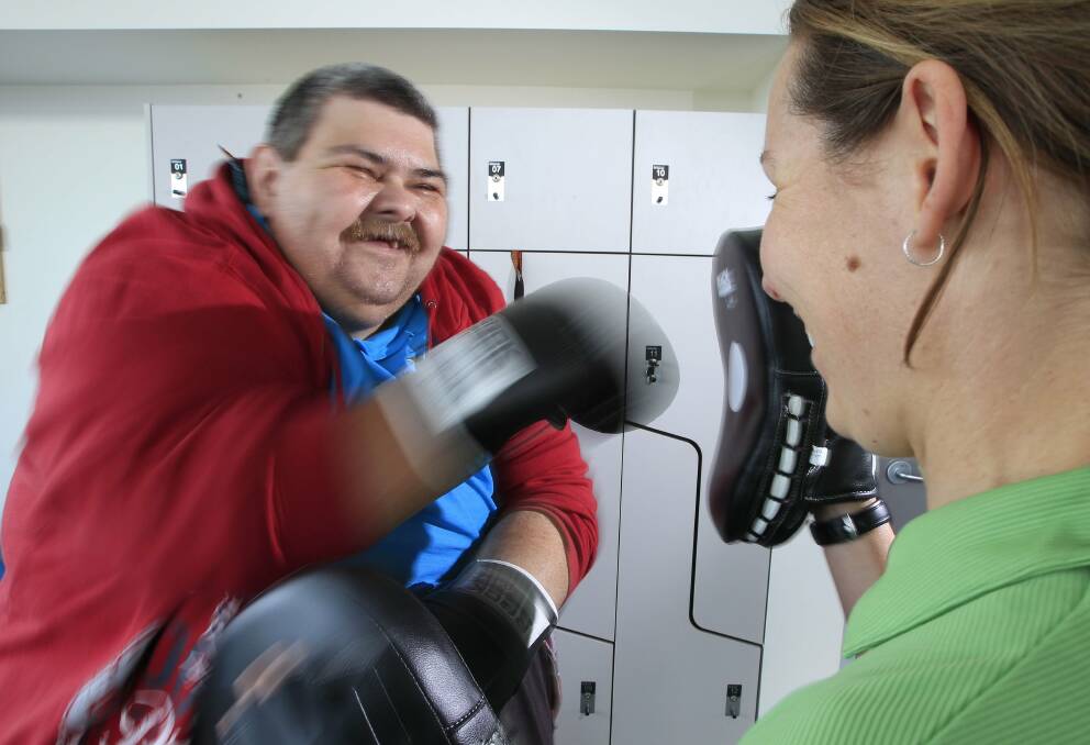 Shane Ford is among a group of Illawarra Aboriginal residents who have completed a statewide health challenge, and says he is boxing, rowing and "feeling fabulous". Picture: ANDY ZAKELI