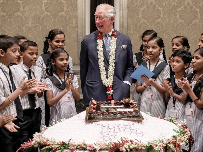 Prince Charles enjoyed a chocolate cake with Mumbai schoolchildren for his 71st birthday.