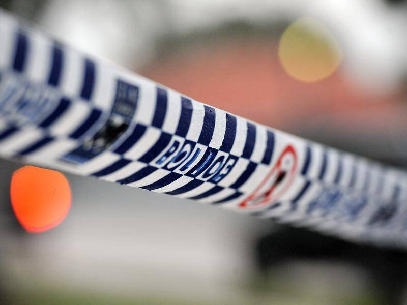 Brisbane police are waiting to speak to a man after a suspicious device sparked two sieges.
