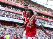 Arsenal's Gabriel Jesus (bottom) celebrates with William Saliba after scoring against Leicester. (EPA PHOTO)