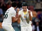 Pat Cummins (r) and his Australian team will play more Test cricket against India and England. (Darren England/AAP PHOTOS)