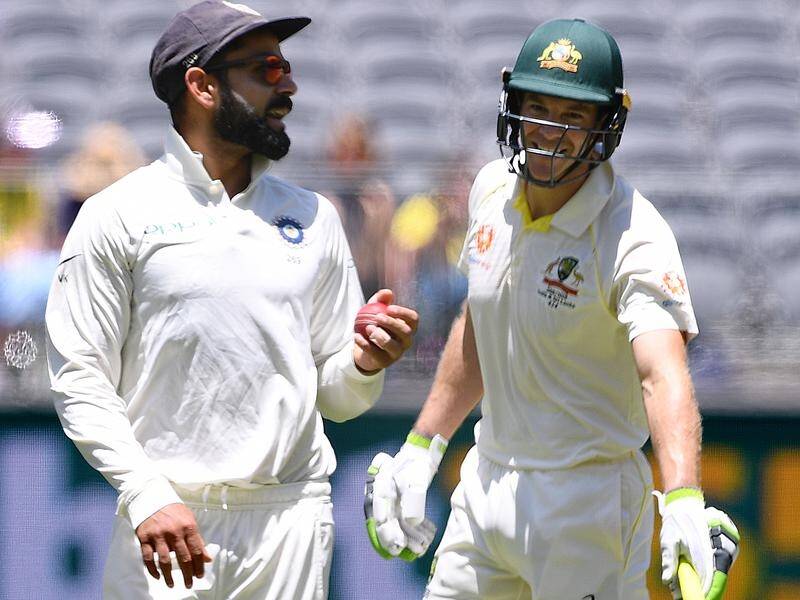 India captain Virat Kohli (l) and Australia captain Tim Paine have engaged in a bit of tit for tat.