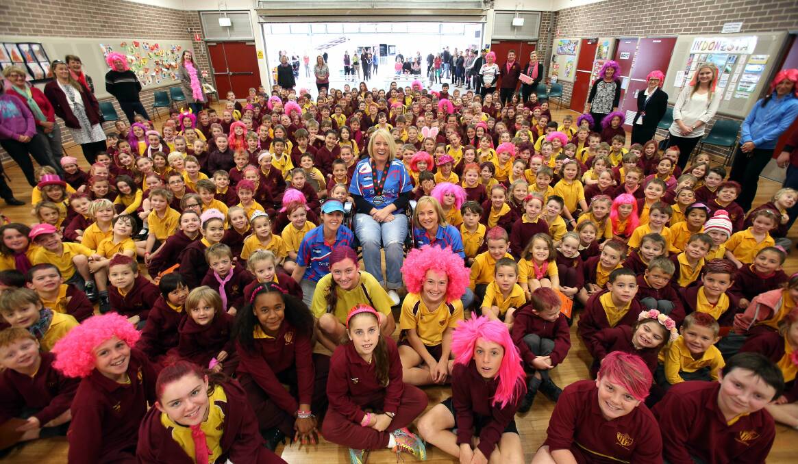Waniora Public students show their support for Sharn McNeill, who is battling motor neurone disease. Pictures: KIRK GILMOUR