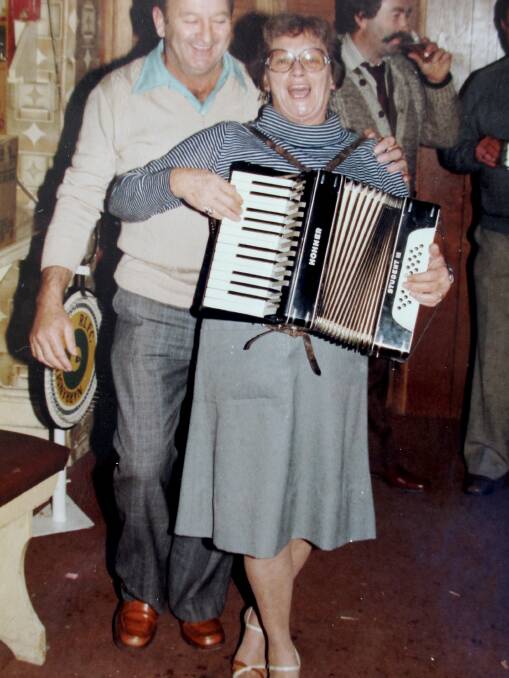 Lola was taught to play the piano by nuns at her school but taught herself the accordion she played in the bush band.