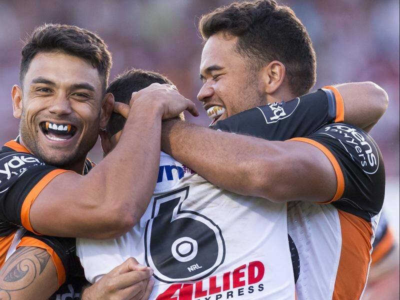 David Nofoaluma (right) has made the most of his return to the Wests Tigers first-grade side.