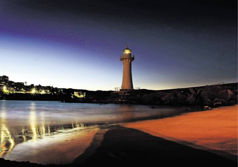 NIGHT LIGHT: Wollongong's Lighthouse is scheduled to be lit up for New Year's Eve, but a positive case of COVID-19 found in the city has put the plans in jeopardy. Picture: Sylvia Liber
