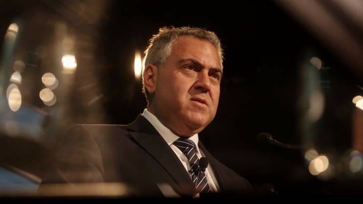 Treasurer Joe Hockey has threatened Queensland-style austerity measures if his budget is not passed. Photo: Andrew Meares