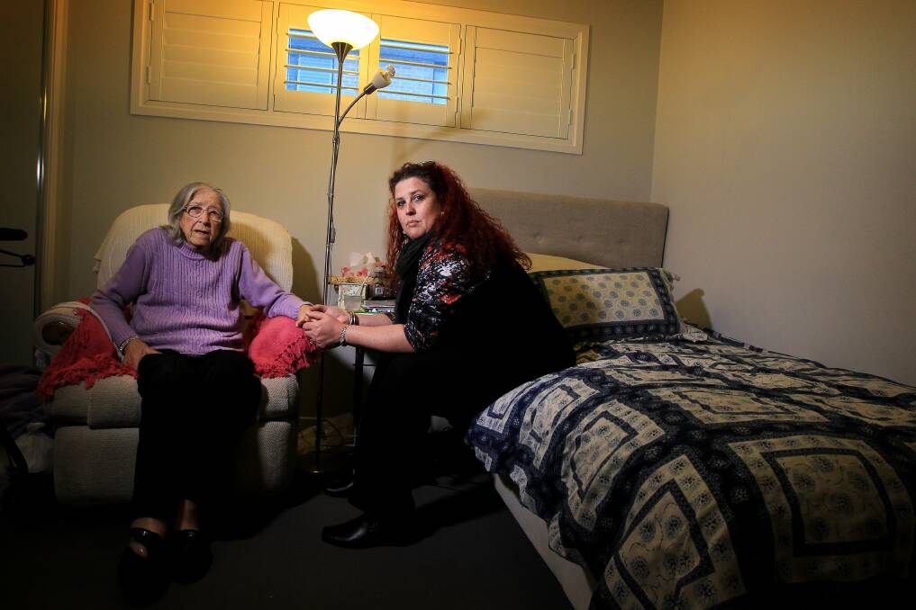 Frustrated: Kellie Rodgers and her mother-in-law Eileen Bird, who needs a working phone connection to operate a medical alert. Picture: SYLVIA LIBER