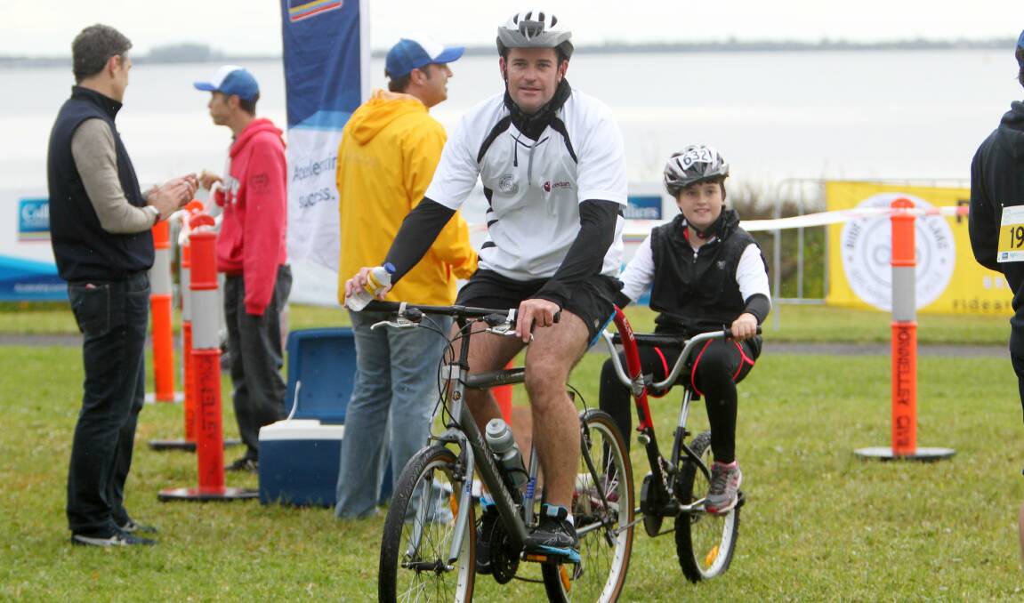 First of the family riders back from the 10km are James and Lily Guest. Picture: GREG TOTMAN