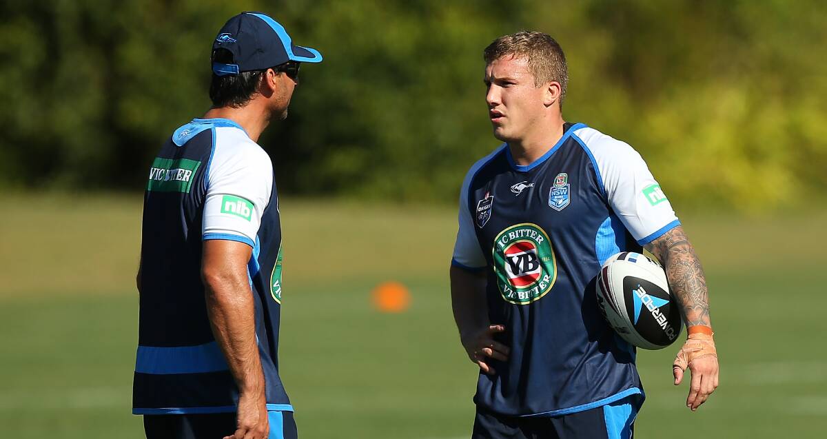 NSW coach Laurie Daley and Trent Hodkinson chat during a training session at Coffs Harbour on Thursday. Picture: GETTY IMAGES