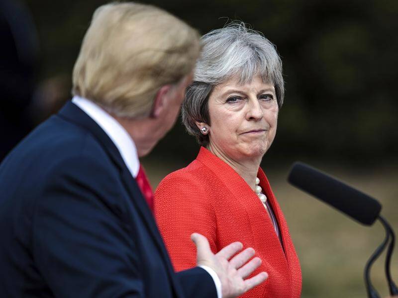 UK Prime Minister Theresa May says US President Donald Trump advised her to sue the EU over Brexit.
