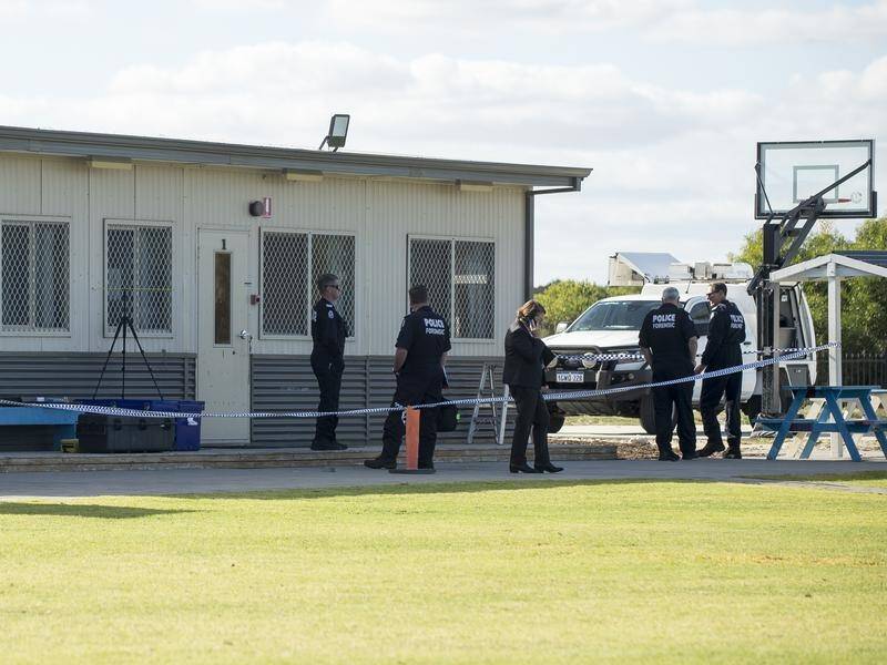 A boy who fired gunshots at a Perth school has pleaded guilty to eight charges. (Aaron Bunch/AAP PHOTOS)