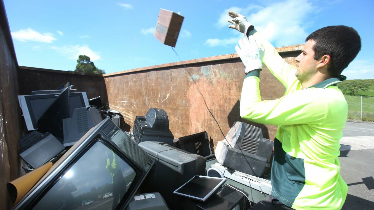 Cody King from Shellharbour City Council recycling e-waste. Picture: ROBERT PEET
