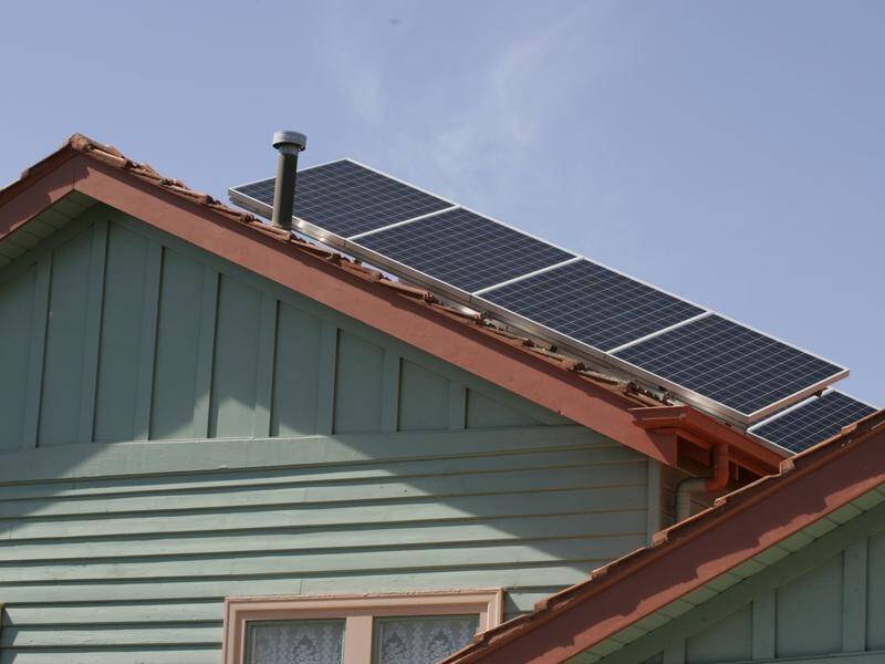 Upgrades to older homes, such as the installation of solar panels, can help slash power bills. (Raoul Wegat/AAP PHOTOS)