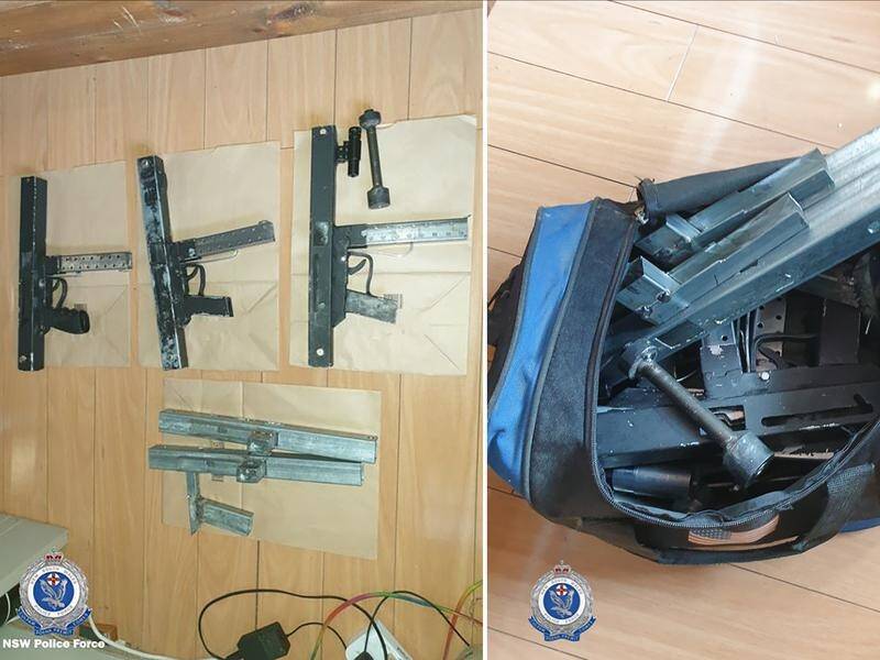 Three homemade submachine guns, ammunition and drugs have been seized from a western Sydney home.