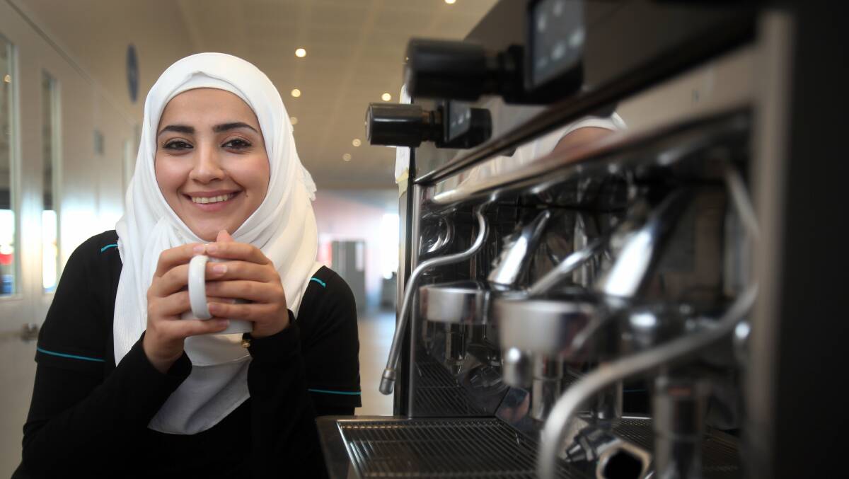 Iraqi refugee Dina Alawag says SCARF has played a big part in her resettlement in the Illawarra. Picture: ROBERT PEET