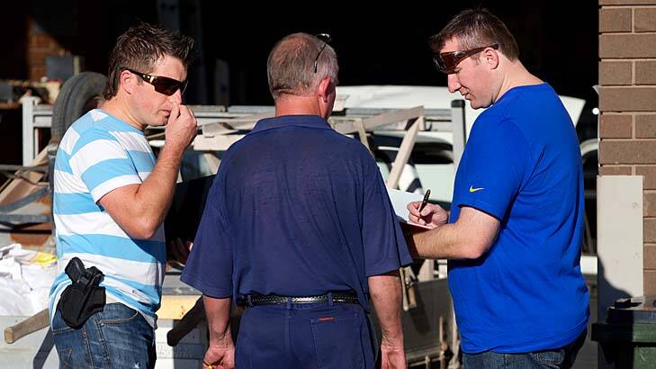 Clues: Detectives interview Padstow residents over the death of Jamie Gao. Photo: Wolter Peeters