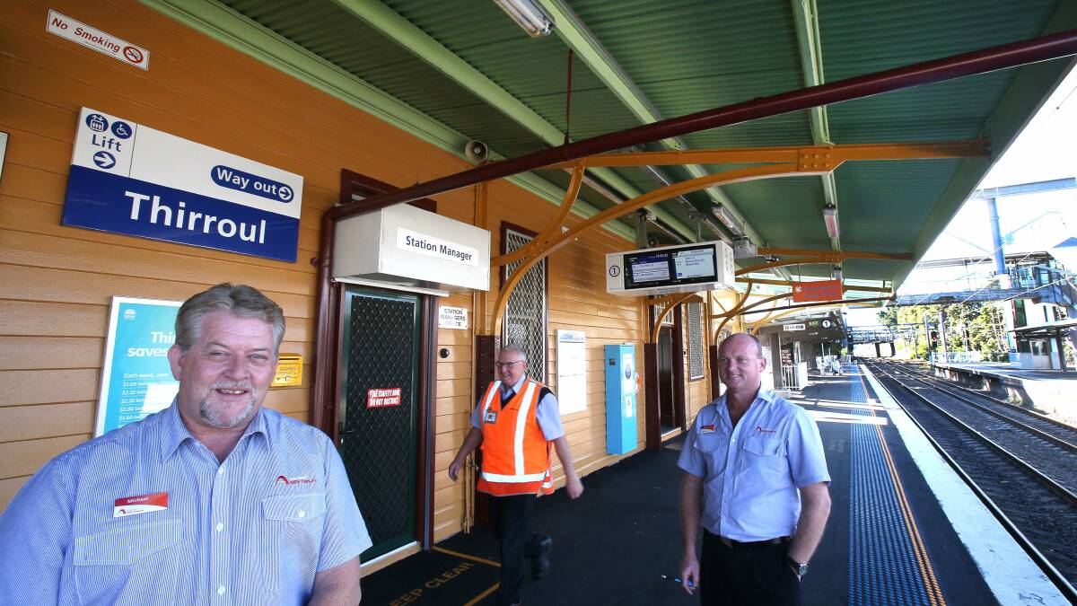 Railway staff at Thirroul station: from left, Michael Keelan, Alan Chapman and Gary Davis. Picture: KIRK GILMOUR