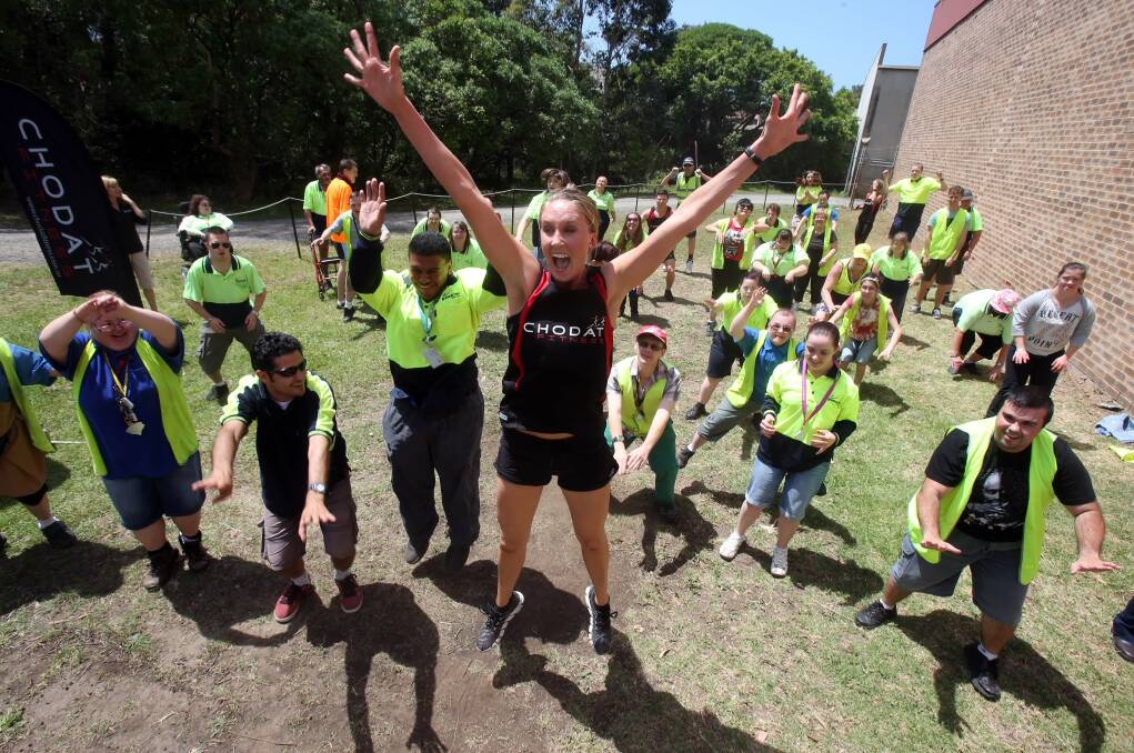 Emily Chodat shows Greenacres employees how to get fit. Picture: ROBERT PEET