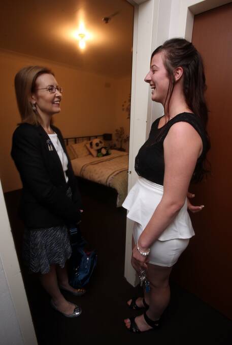 Ms Upton with Southern Youth and Family Services client Robyn Firmin. Picture: ROBERT PEET