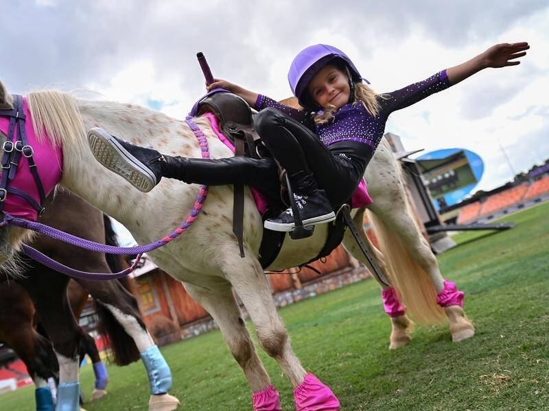 HSL Trick Riding team member Addison Rides, 6, was among the youngest competitors at the show. (Steven Saphore/AAP PHOTOS)