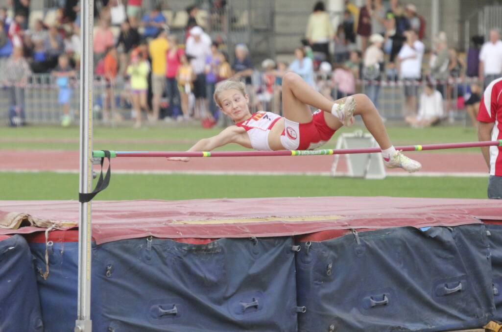 India McKeown makes a clean jump on her way to an excellent sixth in the high jump at the state titles.