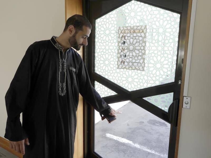 Survivor Khaled Alnobani thinks up to 17 people may have died trying to escape through the door.