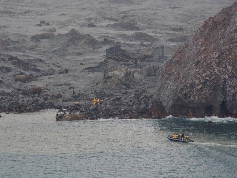 Predicted wild weather at NZ's Whakaari is hampering recovery efforts for two remaining bodies.
