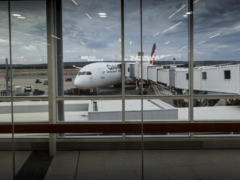 Qantas and Perth Airport have settled a dispute over unpaid fees on 'mutually beneficial terms'.