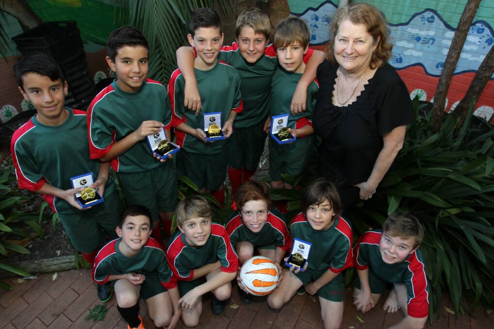 Best in state: The Nareena Hills Public School state champion futsal team. Front row: (from left) Adam and David Chicharo, Tim Caroutas, Logan Mathie, Ned Glasgow. Back row: (from left) Sebastian Stanojovic, Aiden Grbevski, Darcy Hennessy, Thomas Butkovic, Corey Gavin and co-ordinator Cheryl Thompson. Picture: GREG TOTMAN