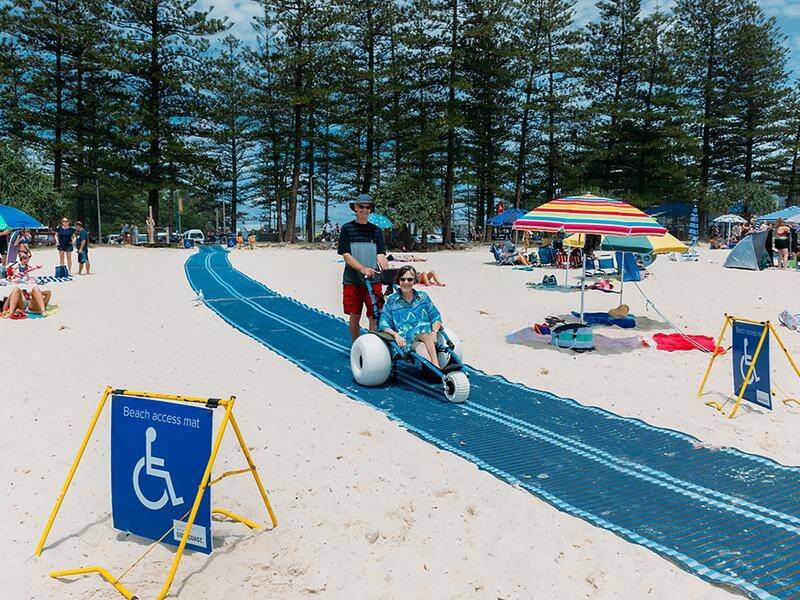 Gold Coast beaches accessible with wheelchair mats & chairs that can travel on sand to water's edge.