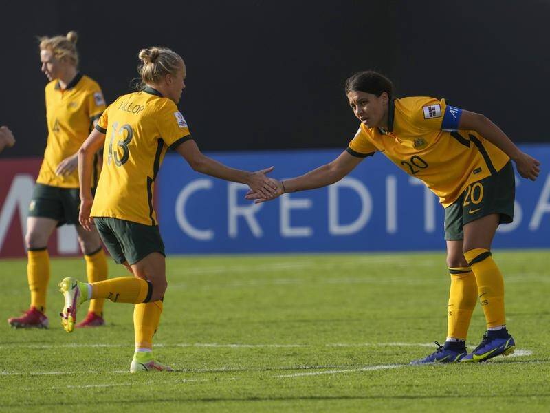 Goalscorer Sam Kerr, being congratulated by Tameka Yallop, is a leader says coach Tony Gustavsson.