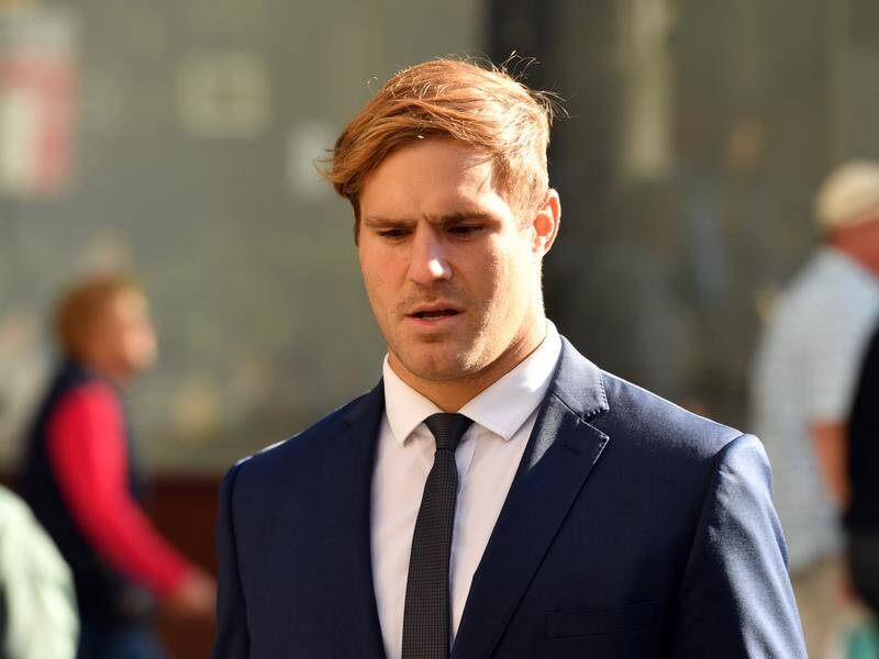 The boss of Jack de Belin's rape accuser has testified at the footballer's retrial.