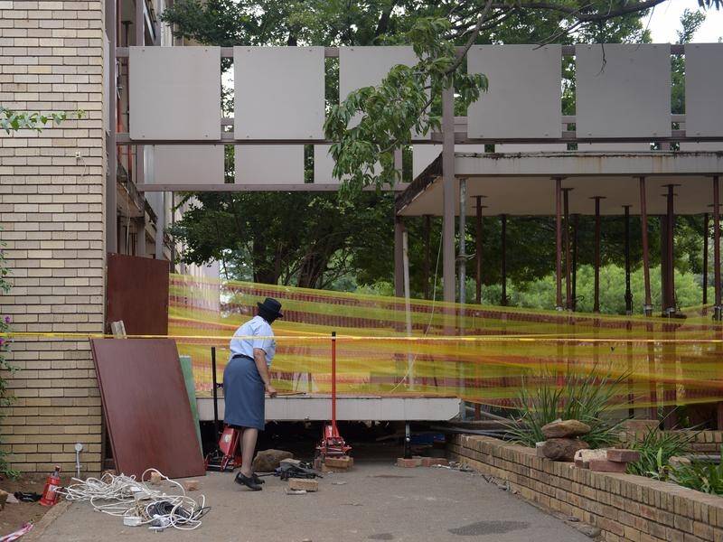 Students became trapped under the walkway when it collapsed at a school outside Johannesburg.