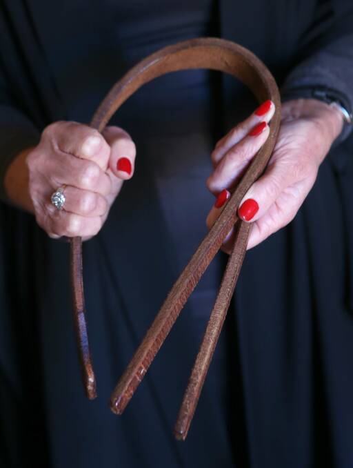 Monica Watt holding her extra hard leather cane she was trained to use back in Scotland. Picture: KIRK GILMOUR