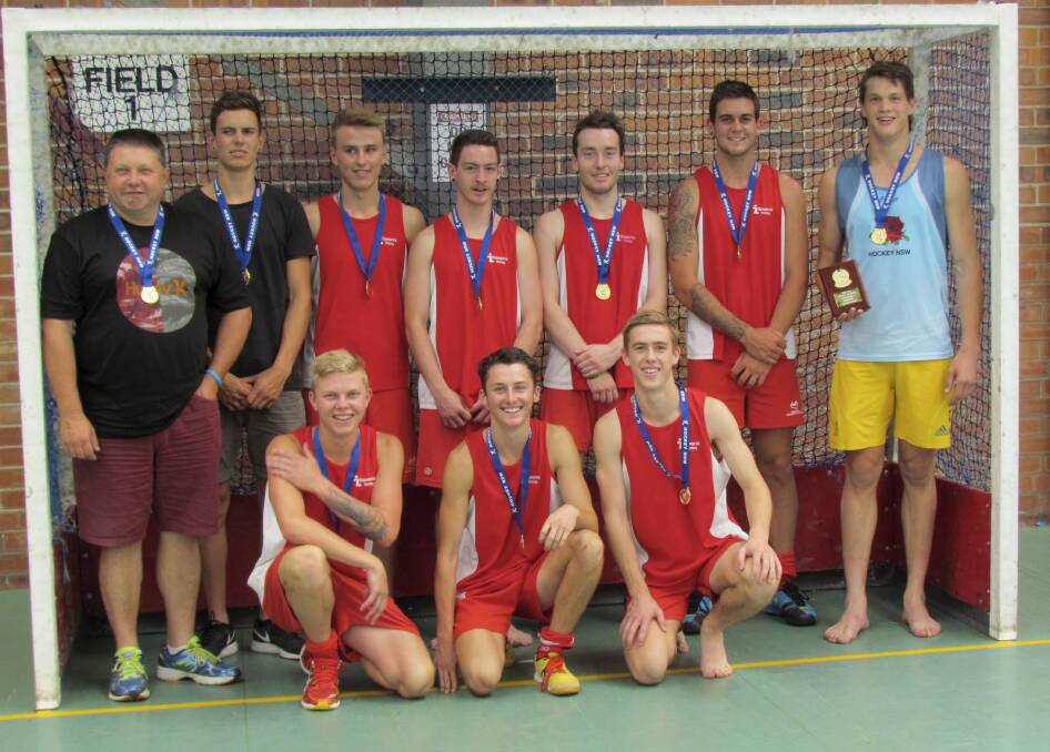 Outstanding: The champion Illawarra under-18s state indoor hockey team. Back: Peter Anderson (manager) Jack Hayes (coach), Jack Donovan, Peter Cowan, Cameron Parsons, Blake Govers and Max Hughes. Front: Brady Anderson, Mitchell Galea and Thomas Miotto.