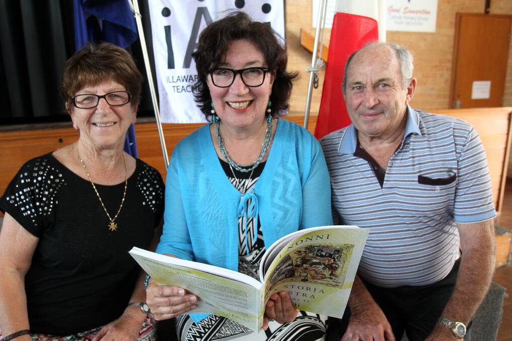 Author Vera Corradini-Cleary (centre) with Clara and Mario Commazzetto, of Tarrawanna, at the launch of I Nonni: La Storia Nostra, which carries migration stories across generations. Picture: GREG TOTMAN