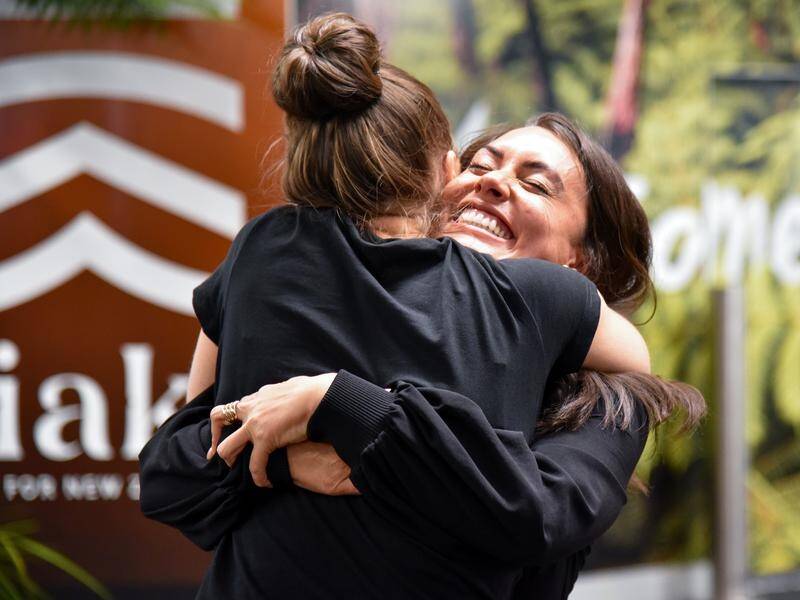 Loved ones have been met with a mighty embrace on the first day of the trans-Tasman bubble.