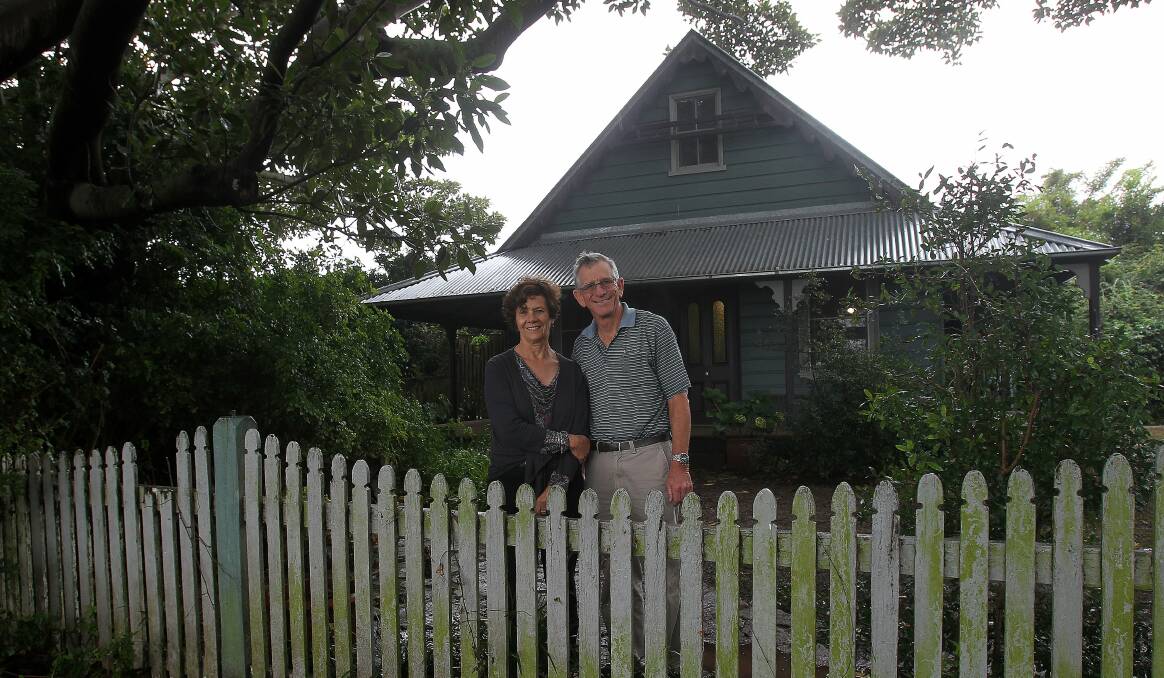 Cousins Sue Dunster and Andrew Wilson outside The Hill homestead in Shellharbour. Picture: GREG TOTMAN